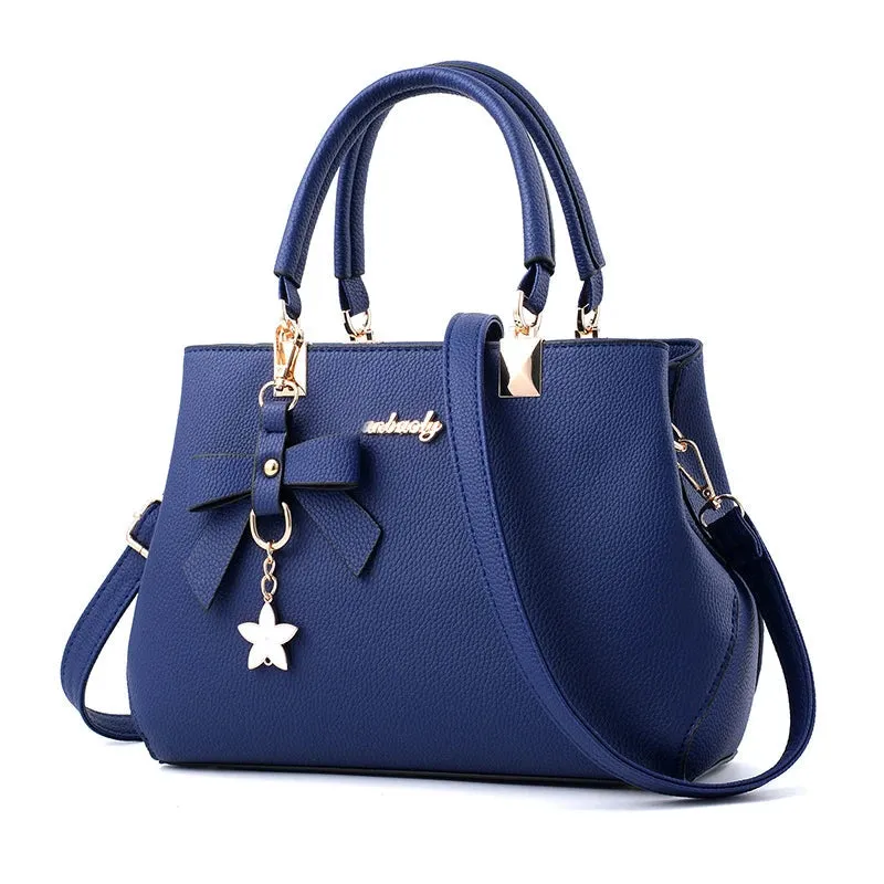 Veloria™ Sparkle Bow Satchel