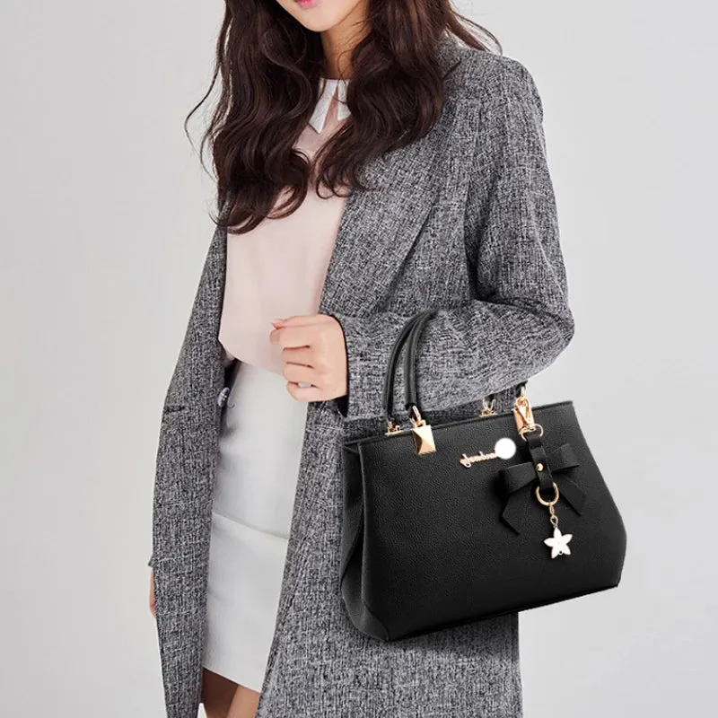 Veloria™ Sparkle Bow Satchel