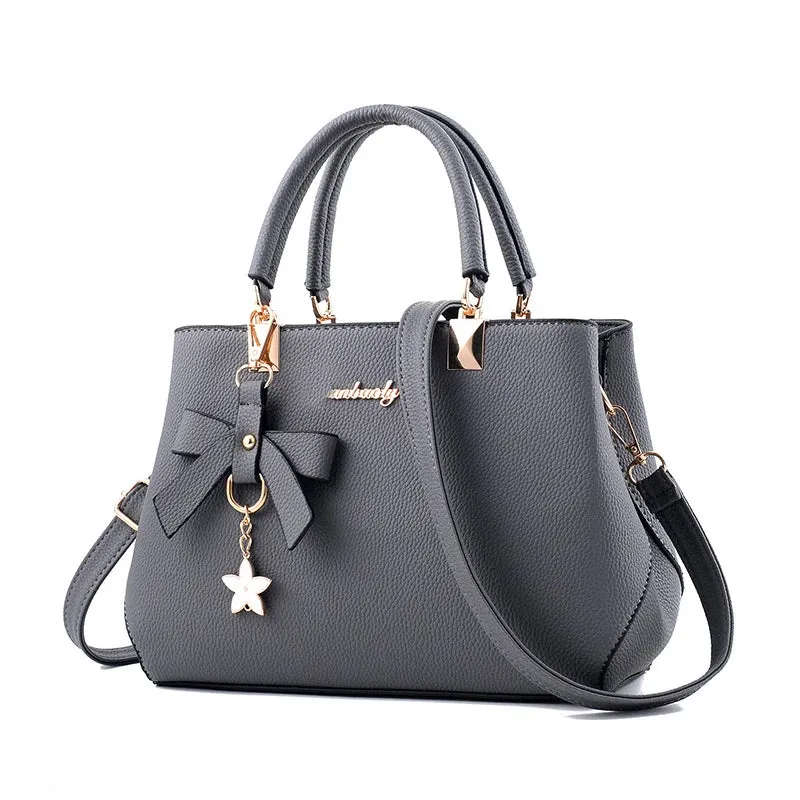 Veloria™ Sparkle Bow Satchel