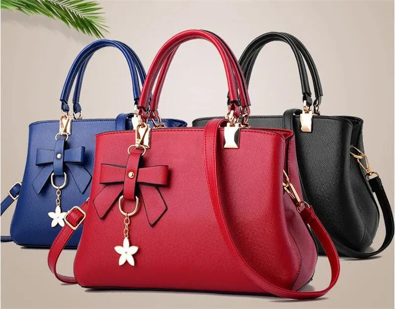 Veloria™ Sparkle Bow Satchel