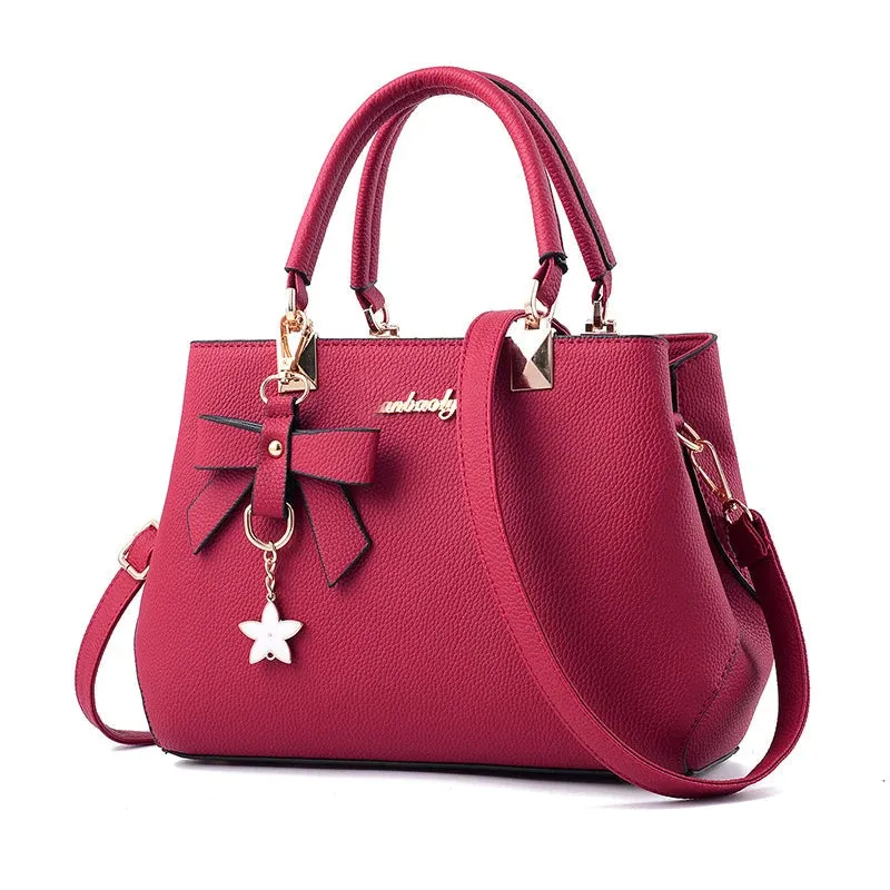 Veloria™ Sparkle Bow Satchel