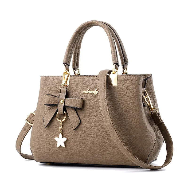 Veloria™ Sparkle Bow Satchel